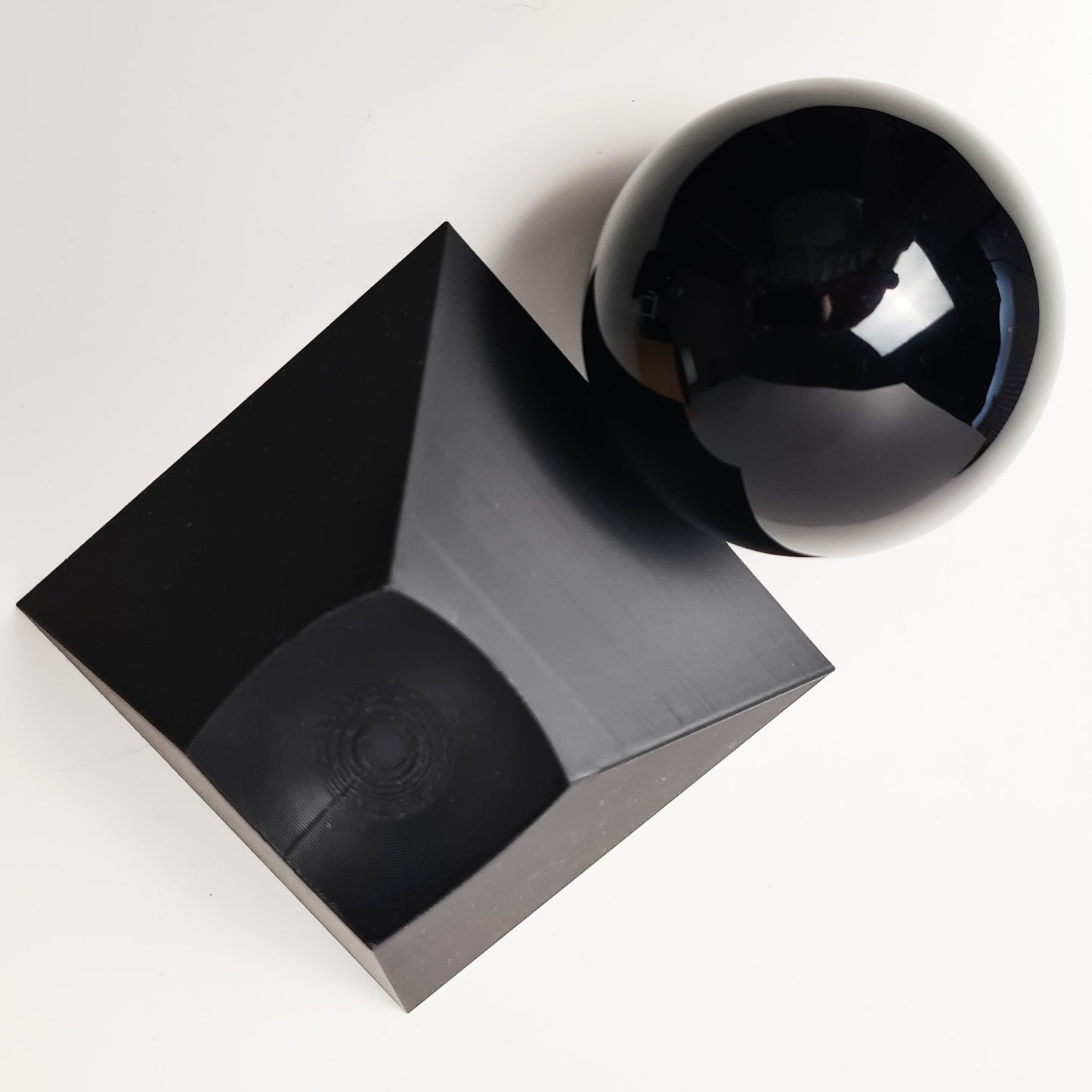Black Obsidian 80mm Sphere with Pyramid Stand