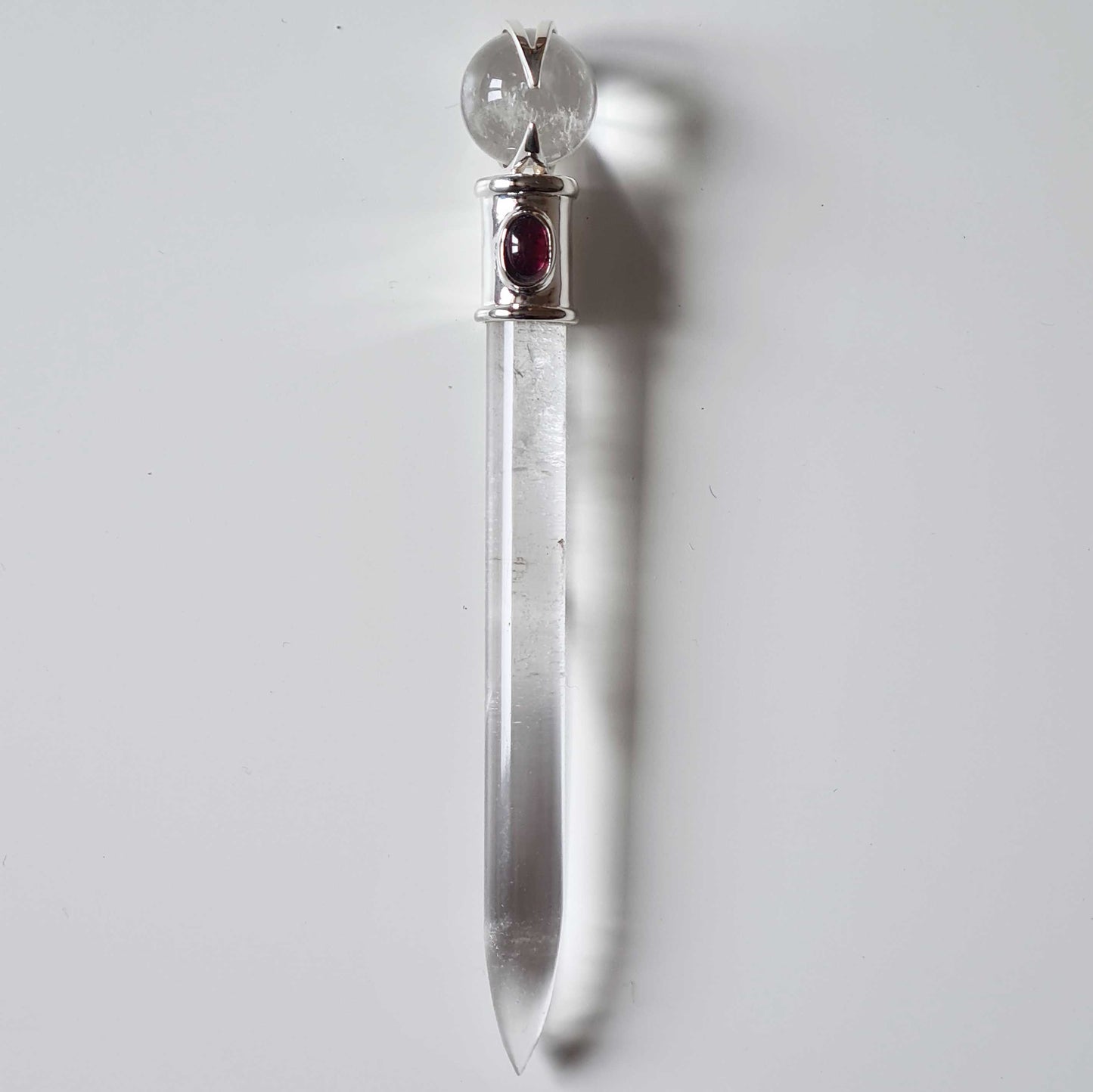 Quartz Crystal Wand with Garnet Accent Stone